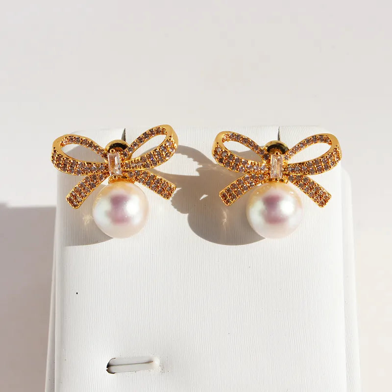 1 Pair Basic Modern Style Classic Style Geometric Bow Knot Plating Inlay Brass Artificial Pearls Zircon Drop Earrings