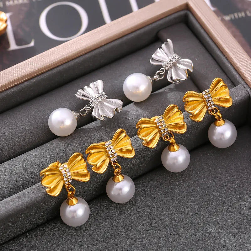 1 Pair Elegant Modern Style Commute Tassel Bow Knot Inlay Titanium Steel Artificial Pearls Rhinestones 18K Gold Plated Drop Earrings