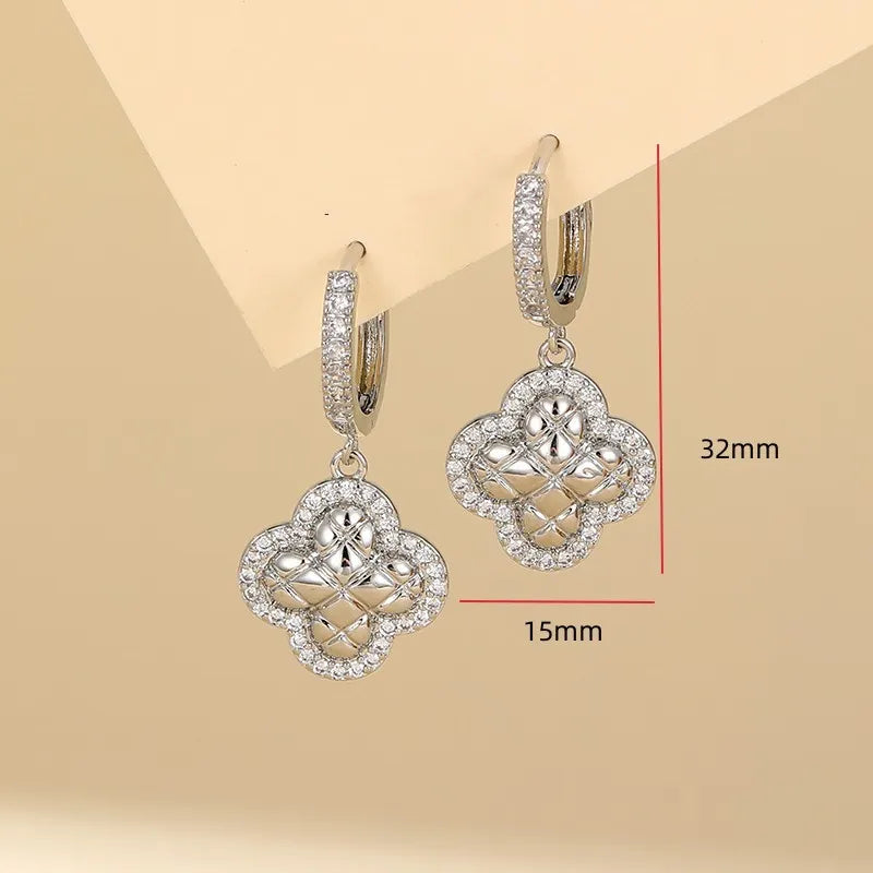 1 Pair Elegant Simple Style Shiny Four Leaf Clover Hollow Out Inlay Copper Zircon KC Gold White Drop Earrings