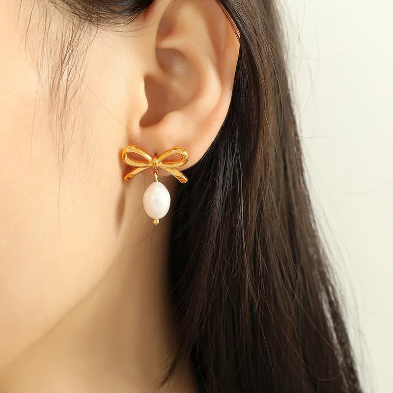 1 Pair Elegant Streetwear Bow Knot Plating Inlay 304 Stainless Steel Artificial Pearls 18K Gold Plated Drop Earrings