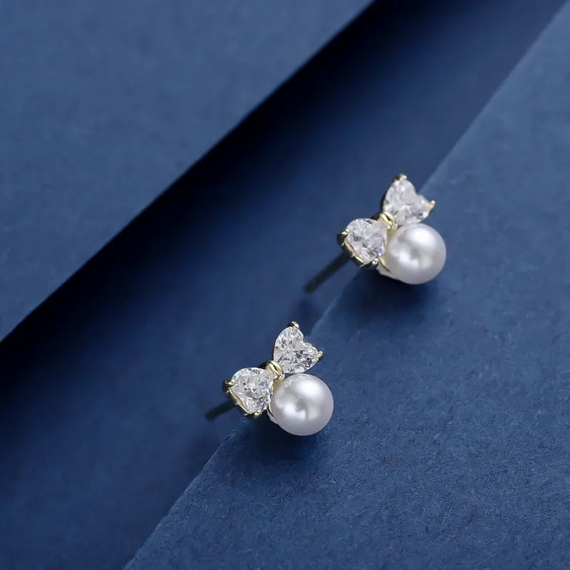 1 Pair Simple Style Classic Style Bow Knot Inlay Sterling Silver Artificial Pearls Zircon 14K Gold Plated Ear Studs