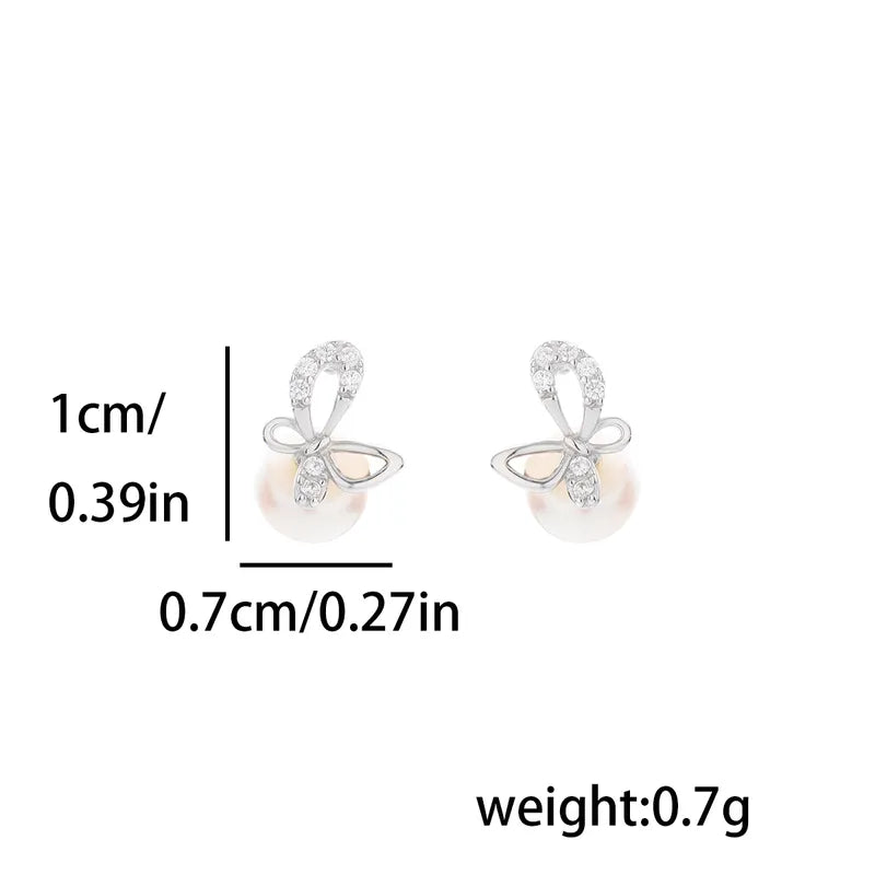 1 Pair Simple Style Classic Style Bow Knot Inlay Sterling Silver Pearl Zircon 14K Gold Plated Ear Studs