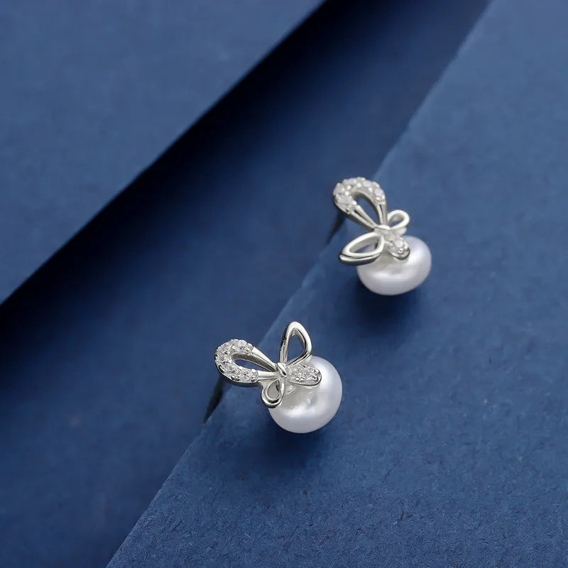 1 Pair Simple Style Classic Style Bow Knot Inlay Sterling Silver Pearl Zircon 14K Gold Plated Ear Studs