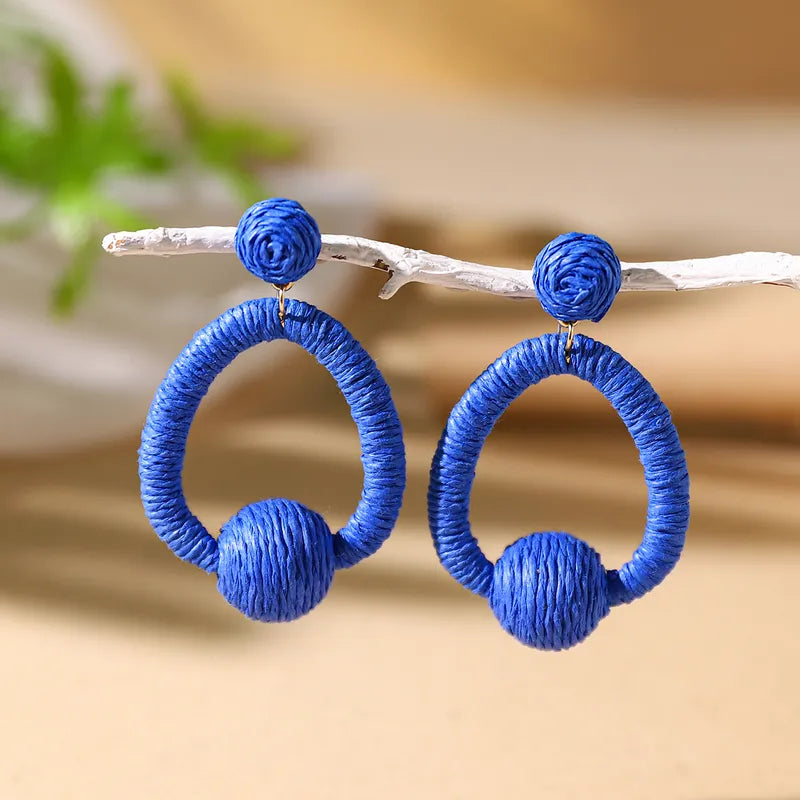 1 Pair Vacation Bohemian Circle Hollow Out Alloy Straw Rattan Drop Earrings