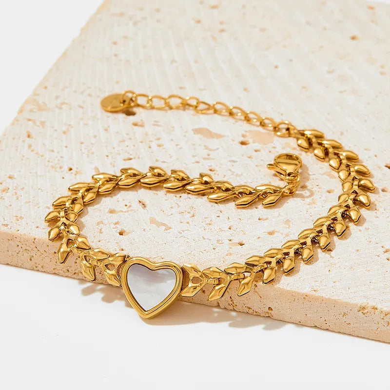 Modern Style Artistic Heart Shape Grain 304 Stainless Steel 16K Gold Plated White Gold Plated Gold Plated Shell Bracelets In Bulk