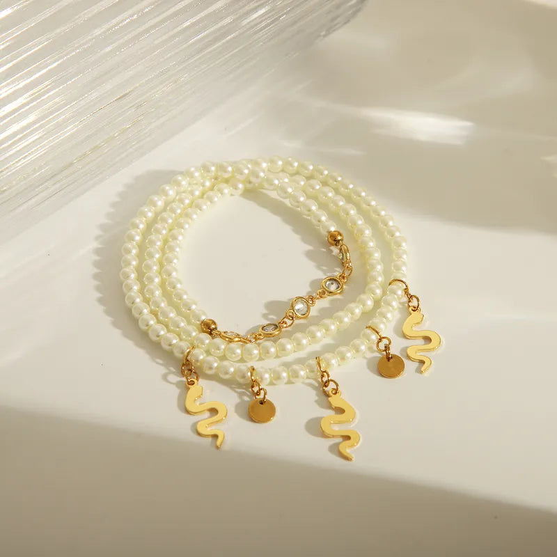 Nordic Style Artistic Devil's Eye Snake 201 Stainless Steel Imitation Pearl 18K Gold Plated Bracelets In Bulk