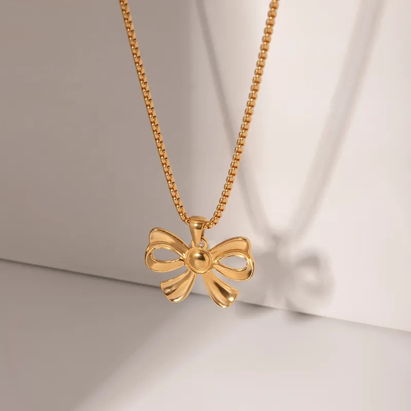 Stainless Steel IG Style Elegant Bow Knot Plating Inlay Artificial Pearls Pendant Necklace