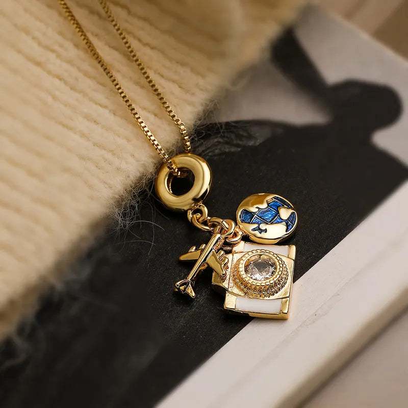 Streetwear Earth Airplane Copper 18k Gold Plated Zircon Pendant Necklace In Bulk