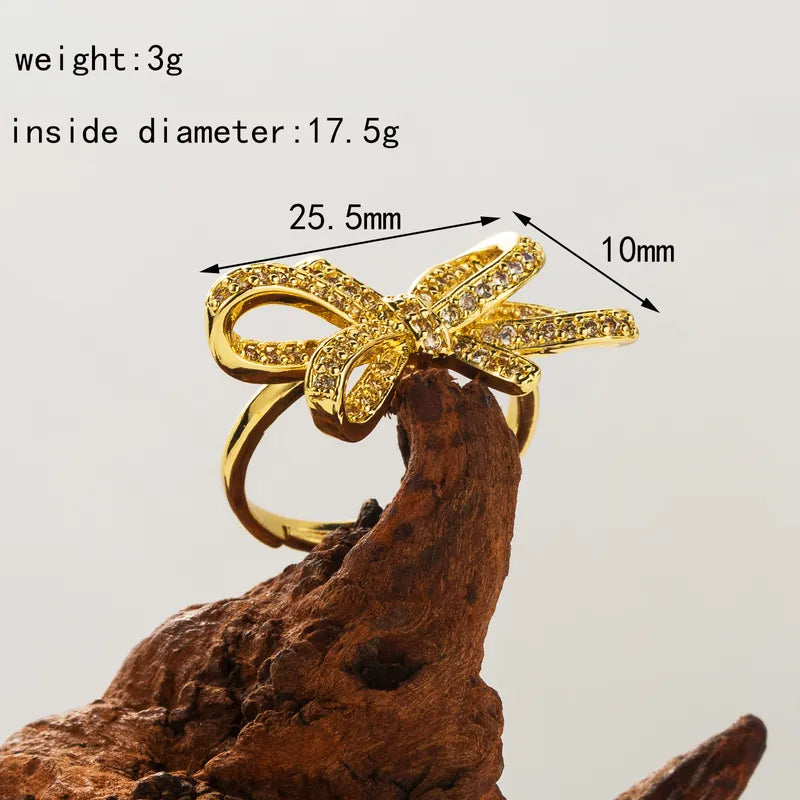 Wholesale Casual Cute Bow Knot Copper Plating Inlay 18K Gold Plated Zircon Open Rings